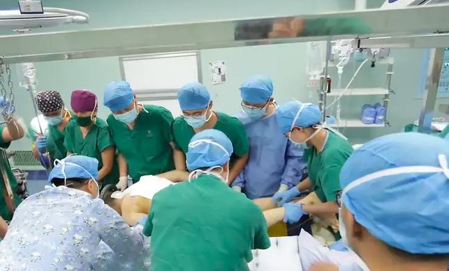AsiaWire Doctors had to break Li's bones to straighten it.
